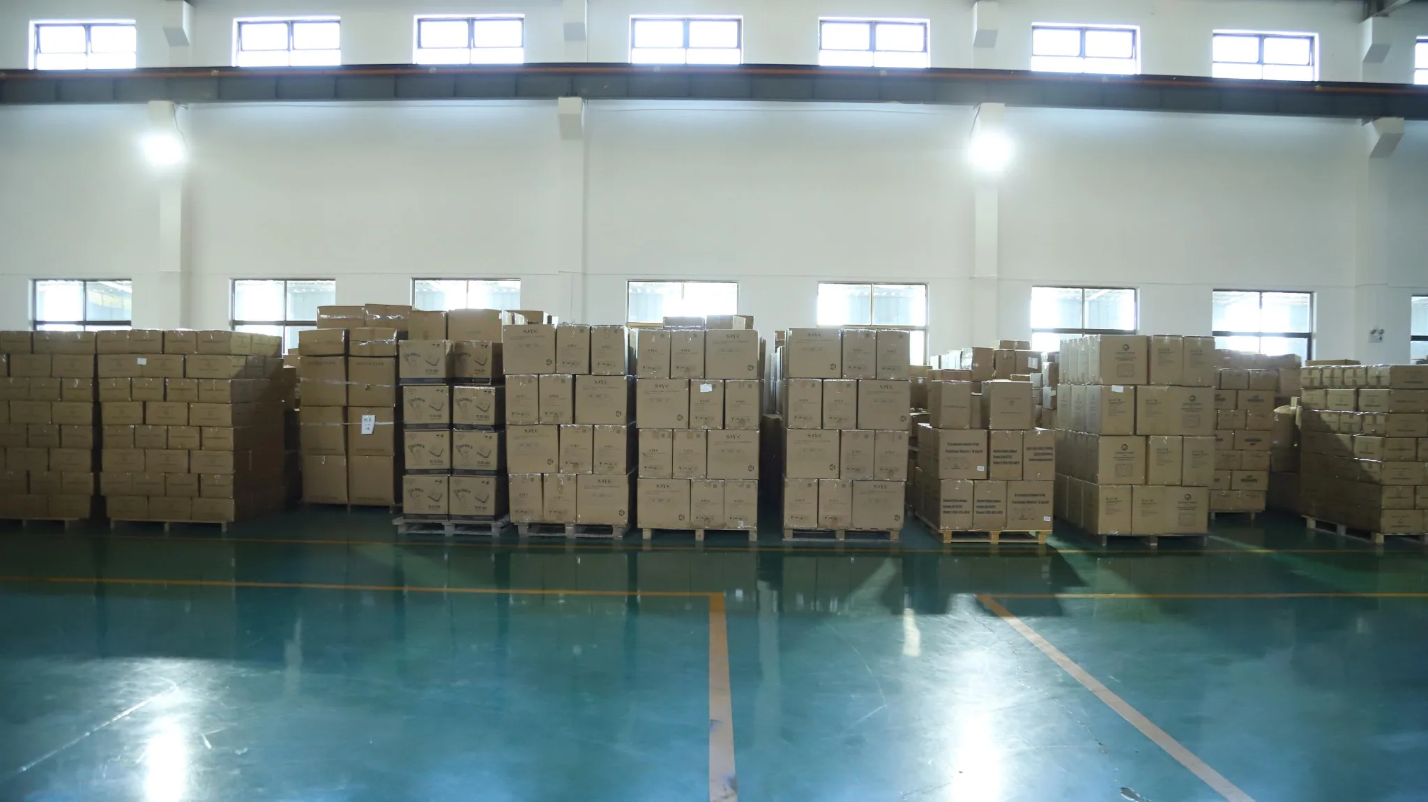 Warehouse with palletized cartons ready for shipment