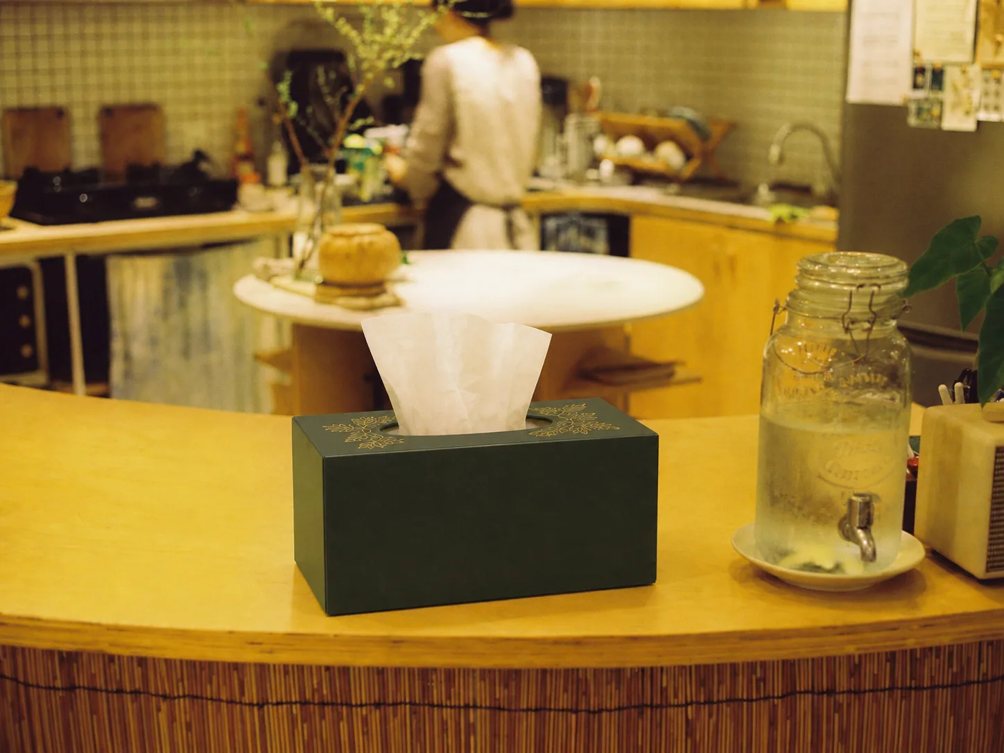 Custom facial tissue box on a restaurant service counter