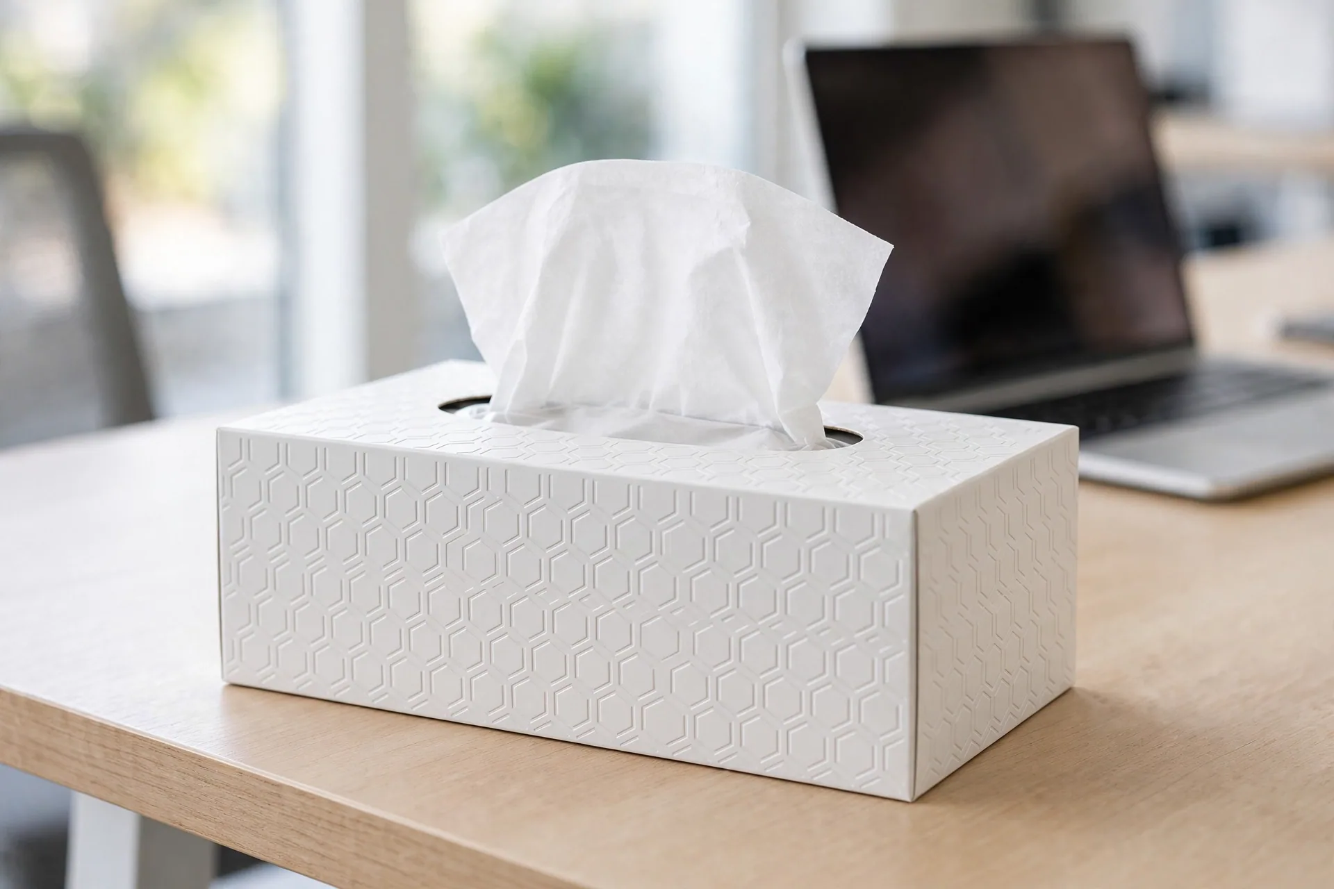 Rectangular top-opening custom tissue box on a countertop